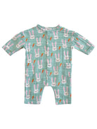 Light blue baby romper with rabbit and carrot patterns, featuring short sleeves and button front.