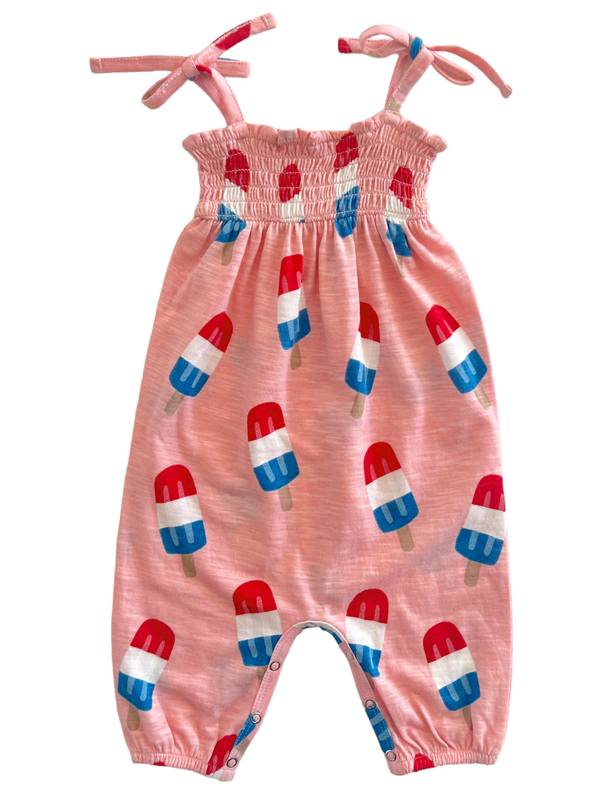 Pink romper with red, white, and blue popsicle pattern and adjustable straps, perfect for warm weather.