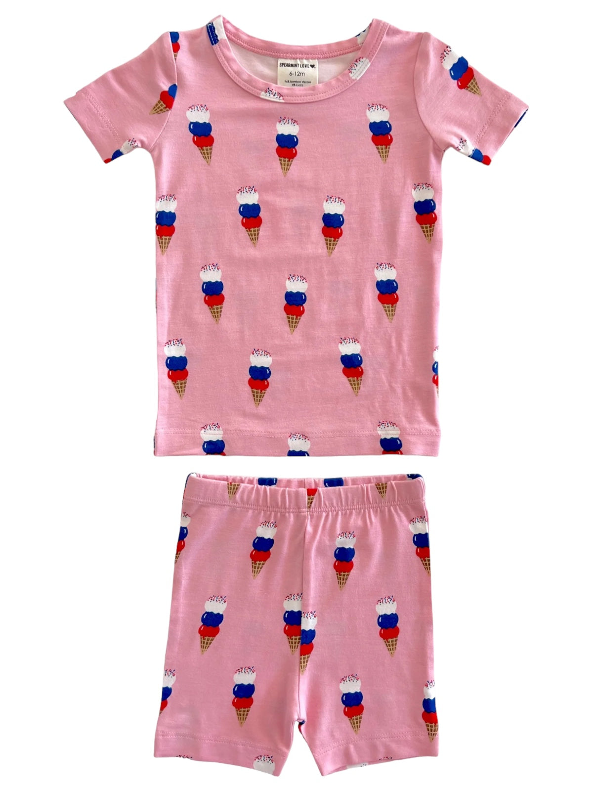Pink kids' short pajamas with colorful ice cream cone print, featuring blue, red, and white accents.