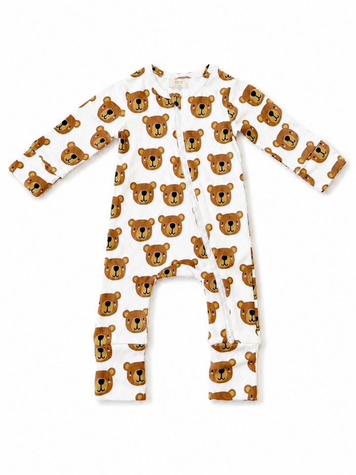 White onesie featuring cute brown bear faces, designed for infants with a front zipper closure.