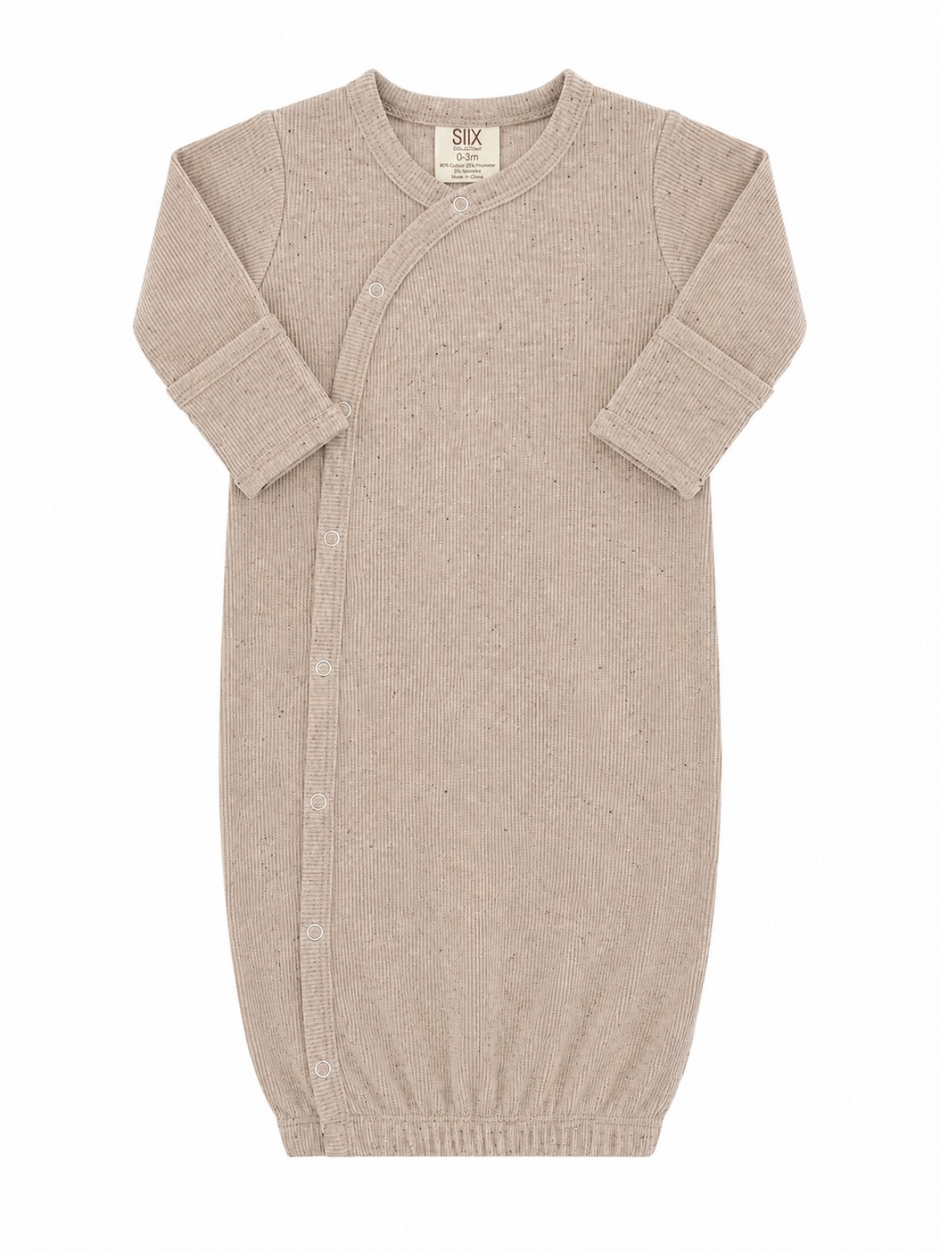 Light beige newborn sleep sack with ribbed texture and snap buttons, designed for comfort and ease of use.