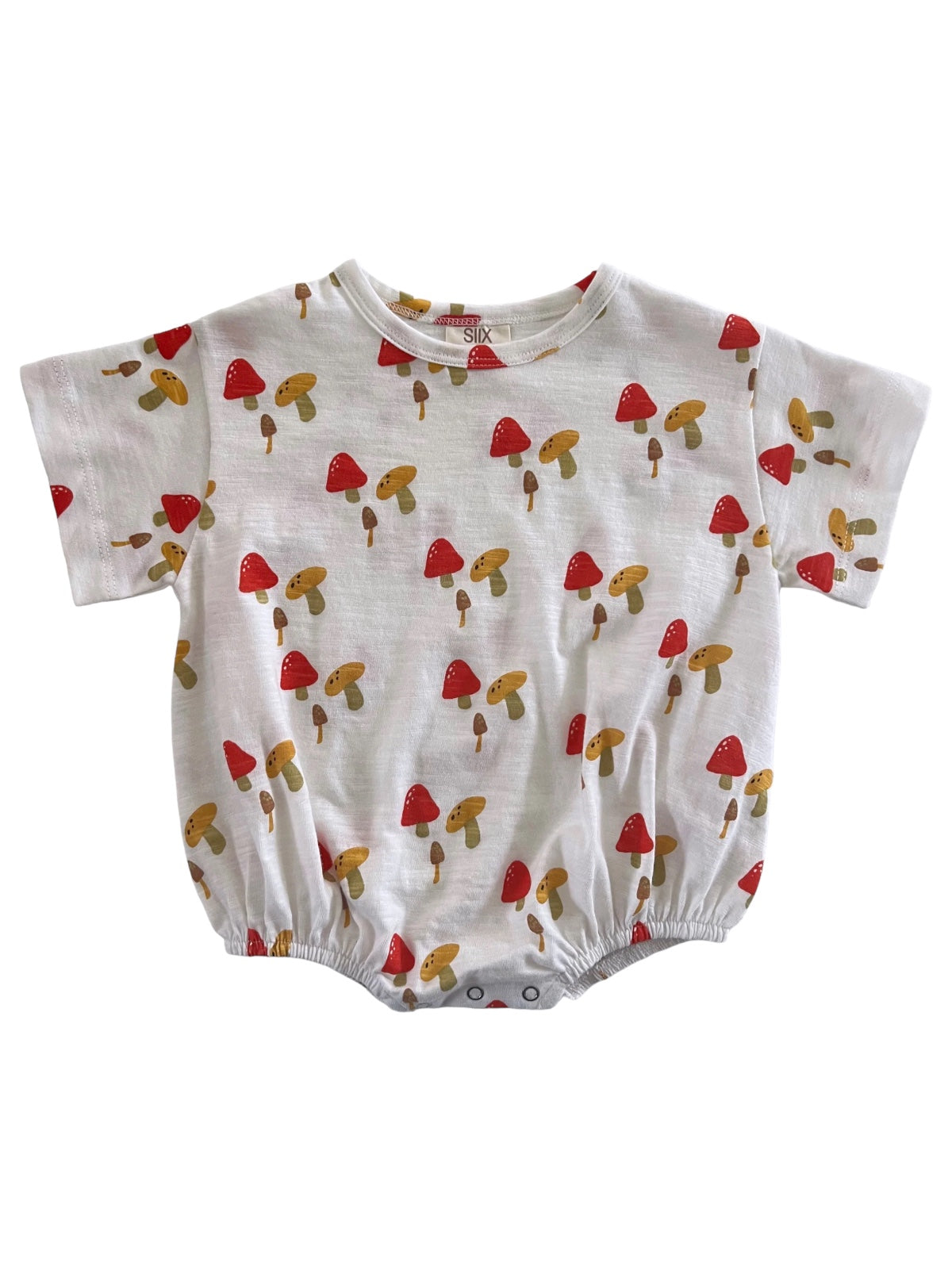 Children's short-sleeve romper featuring a whimsical mushroom pattern in red and yellow on a white background.
