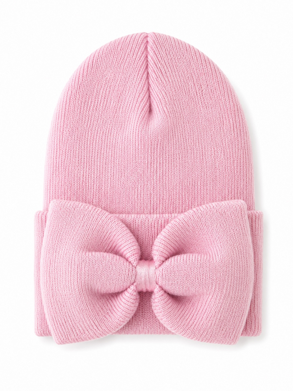 Pink knit beanie with a large bow detail on the front, perfect for stylish warmth in cold weather.