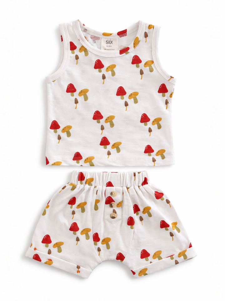 White baby outfit featuring a tank top and shorts with colorful mushroom prints. Perfect for infants.
