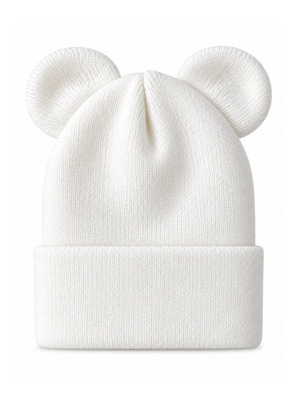 White knit beanie with two round ear-like features on top.