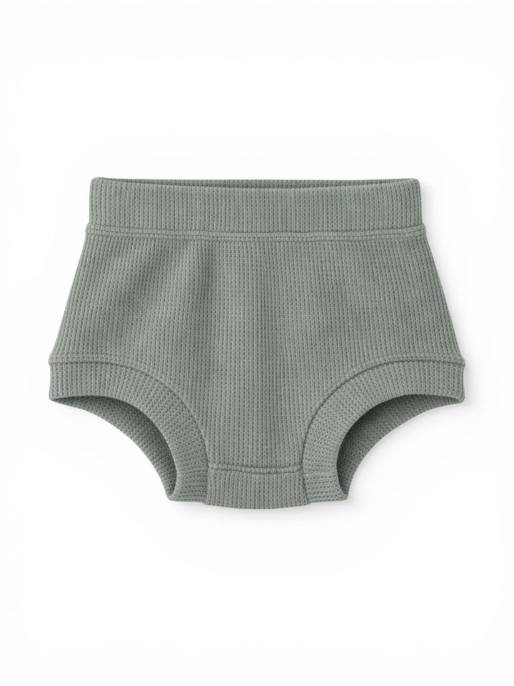 Light green waffle-knit boyshorts on a white background. Ideal for comfort and style.