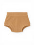 Tan ribbed toddler underwear flat lay on a white background.