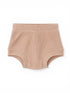 Light pink ribbed baby shorts with a comfortable waistband, designed for warmth and ease of movement.
