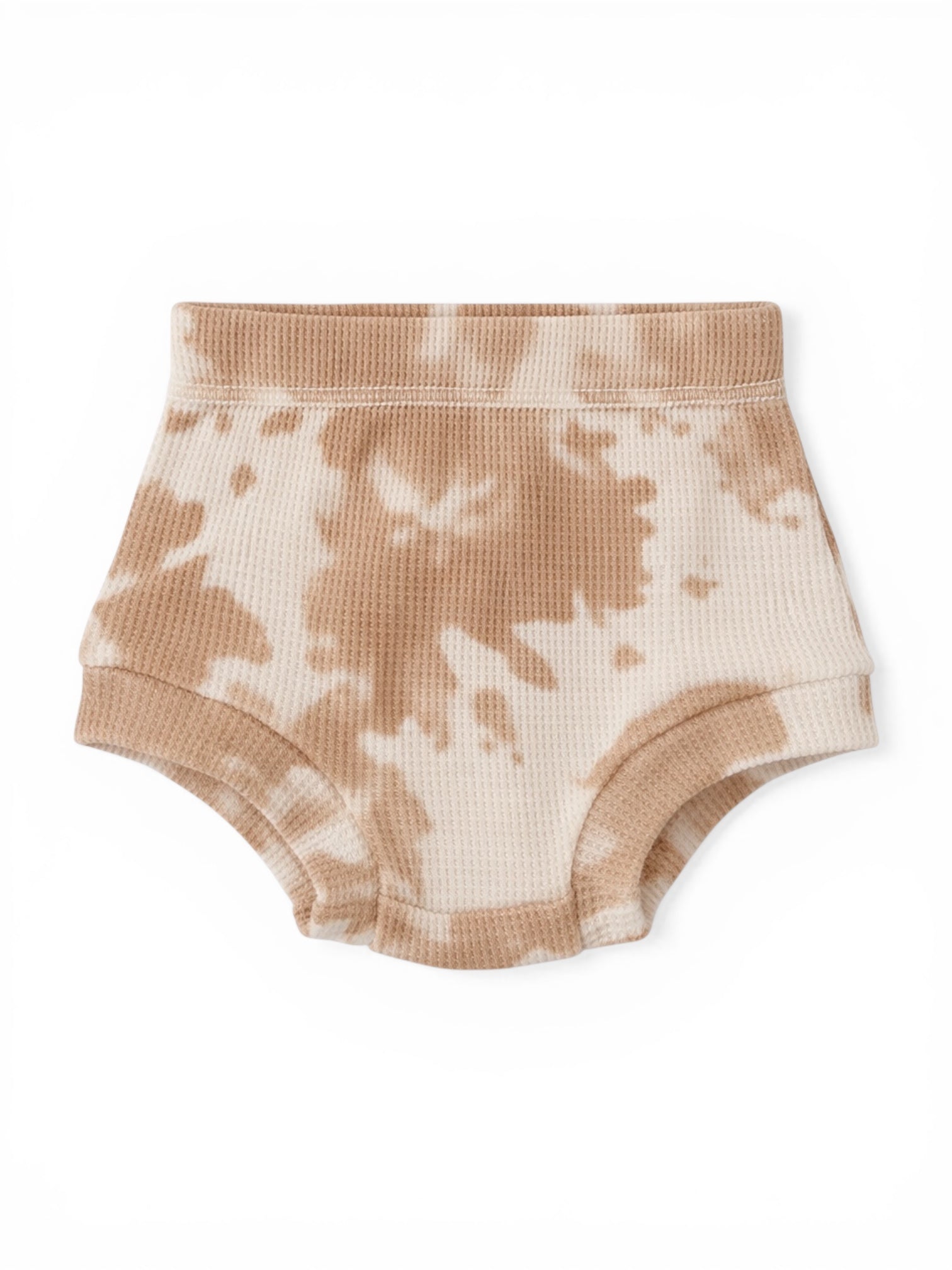 Tan tie-dye children's underwear on a white background. Soft, ribbed texture with elastic waistband.