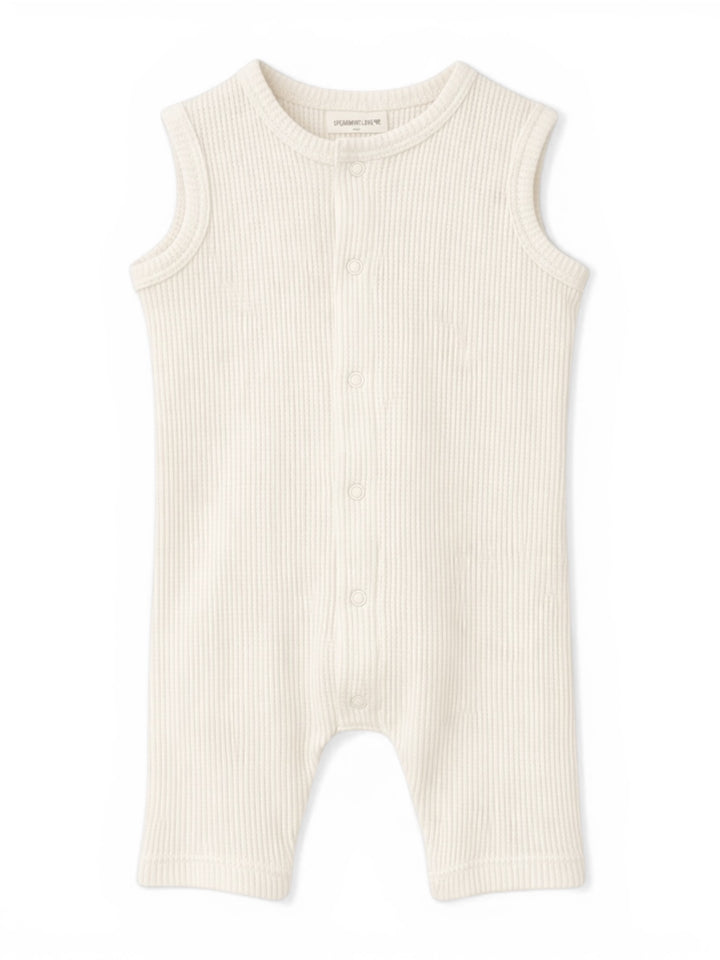 Light cream-colored baby romper with sleeveless design and front buttons, made from ribbed fabric.
