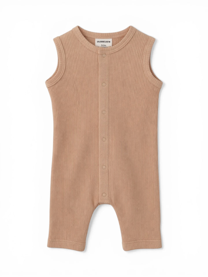 Tan ribbed baby romper with shoulder snaps and short legs, ideal for warm-weather outfits.