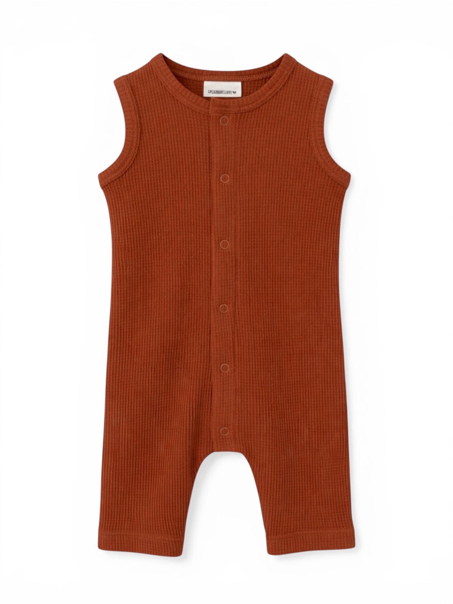 Rust-colored baby romper with ribbed texture and snap buttons down the front. Perfect for warm weather wear.