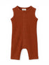Rust-colored baby romper with ribbed texture and snap buttons down the front. Perfect for warm weather wear.