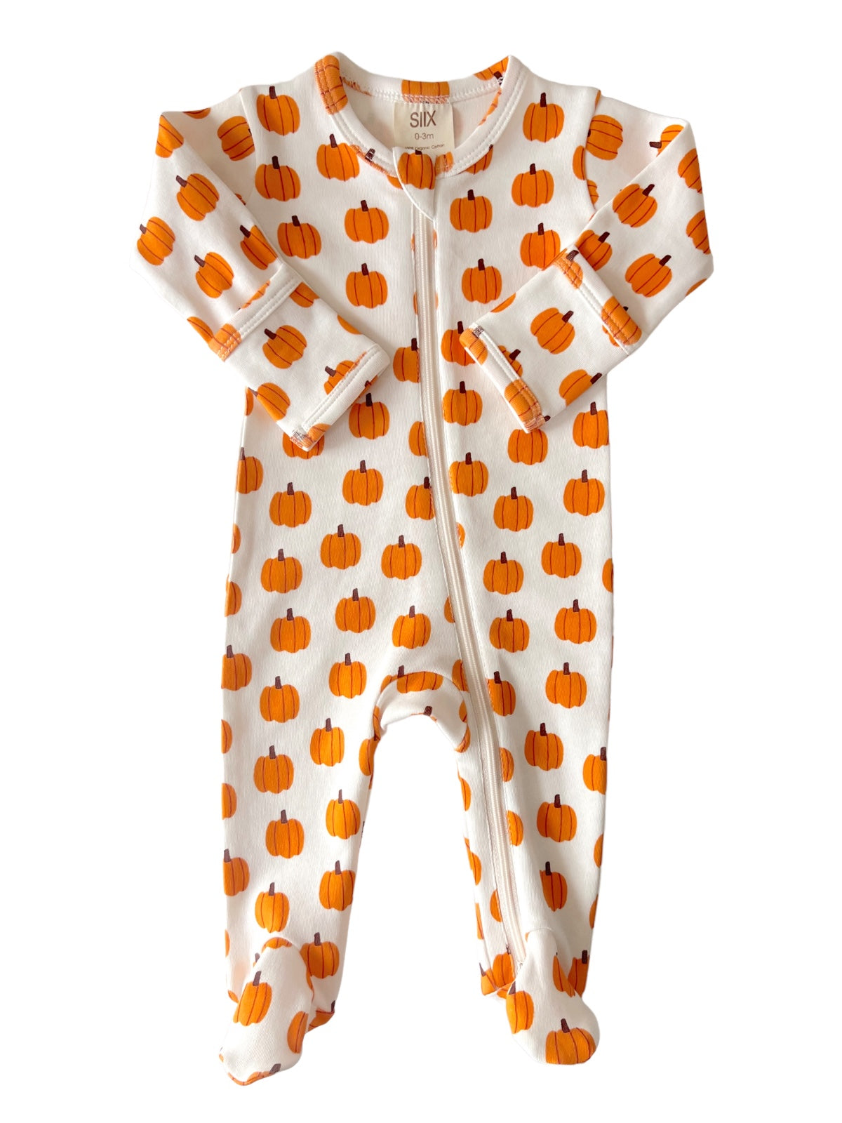 Baby onesie with orange pumpkin pattern on a white background, featuring a front zipper and footed legs.