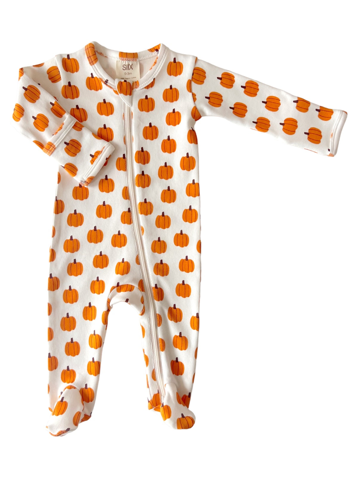 Baby pajama romper with orange pumpkin pattern on a white background, featuring a front zipper and footed design.