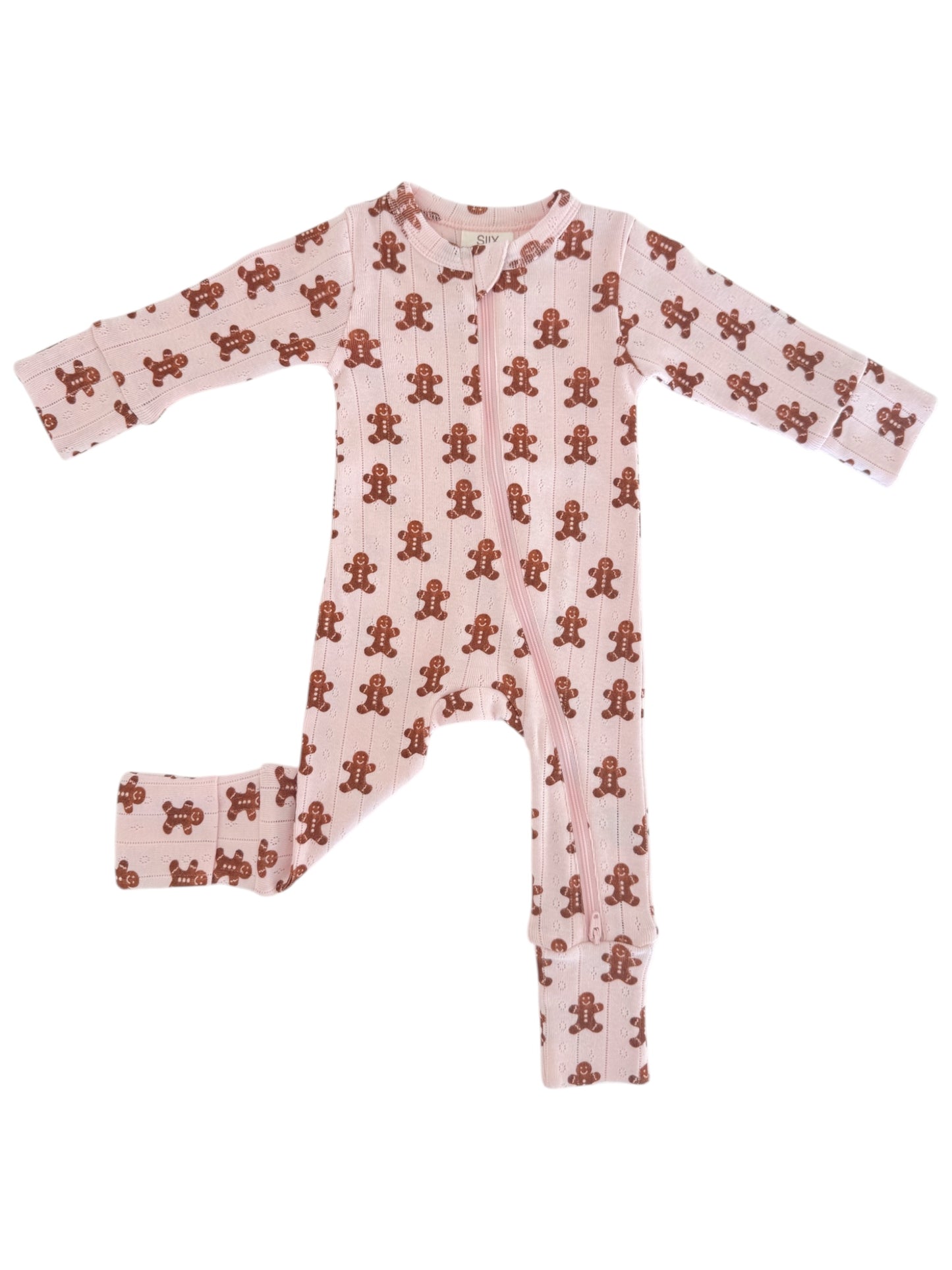 Pink onesie with gingerbread man pattern, featuring long sleeves and front zip closure for infants.