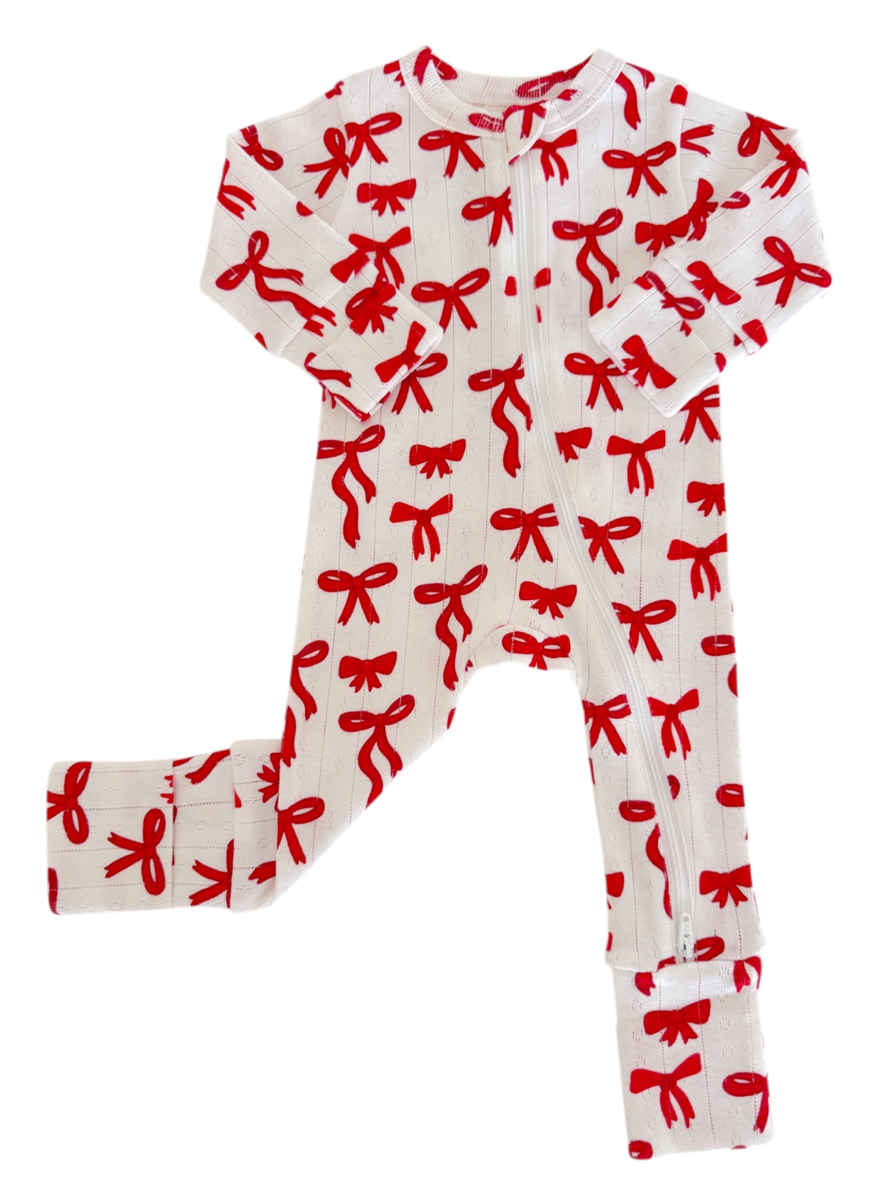Red bow-patterned white onesie with zip closure, ideal for infants and toddlers.
