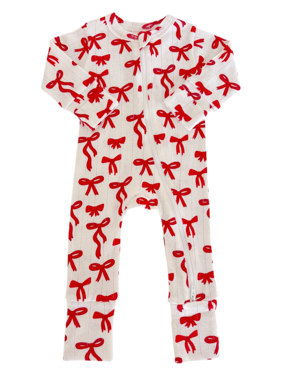 White onesie with red bows, featuring a full zip and long sleeves, perfect for infants or toddlers.