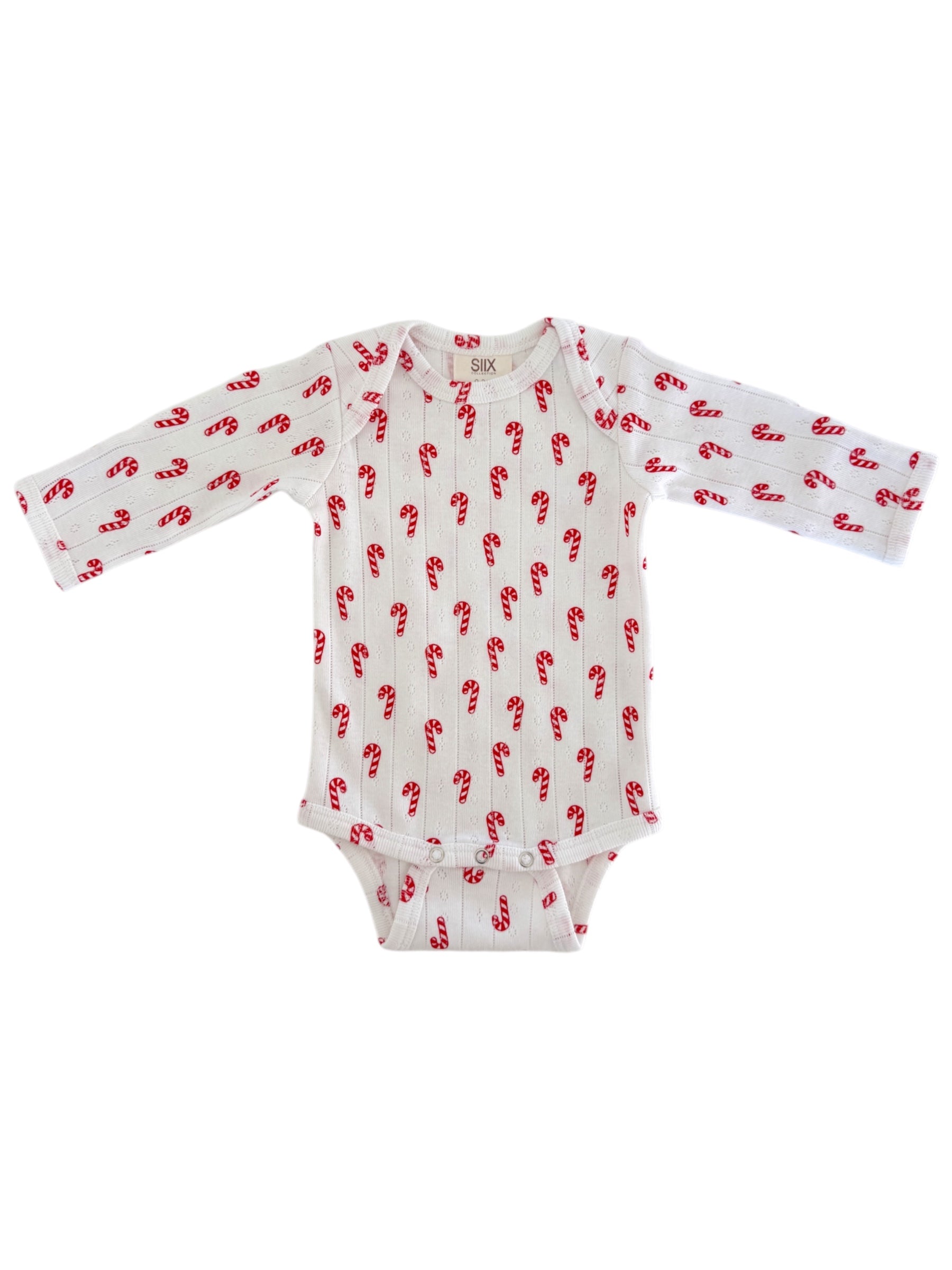 White baby bodysuit with long sleeves, printed with red candy canes. Perfect for festive occasions.