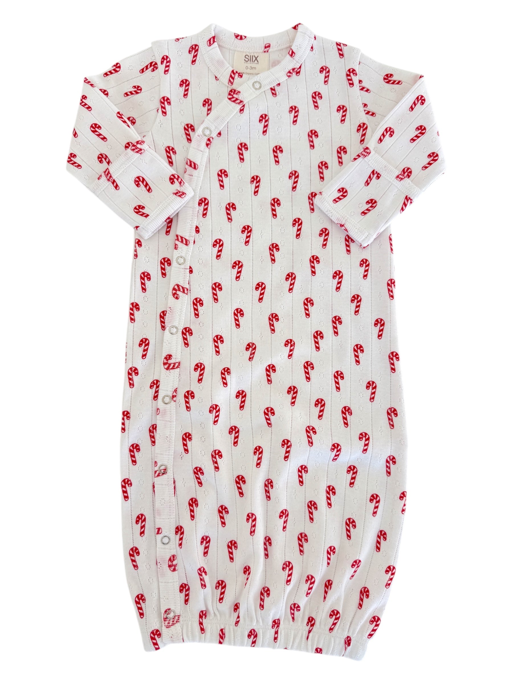 White baby gown with red candy cane print and snap buttons, suitable for newborns up to 3 months.