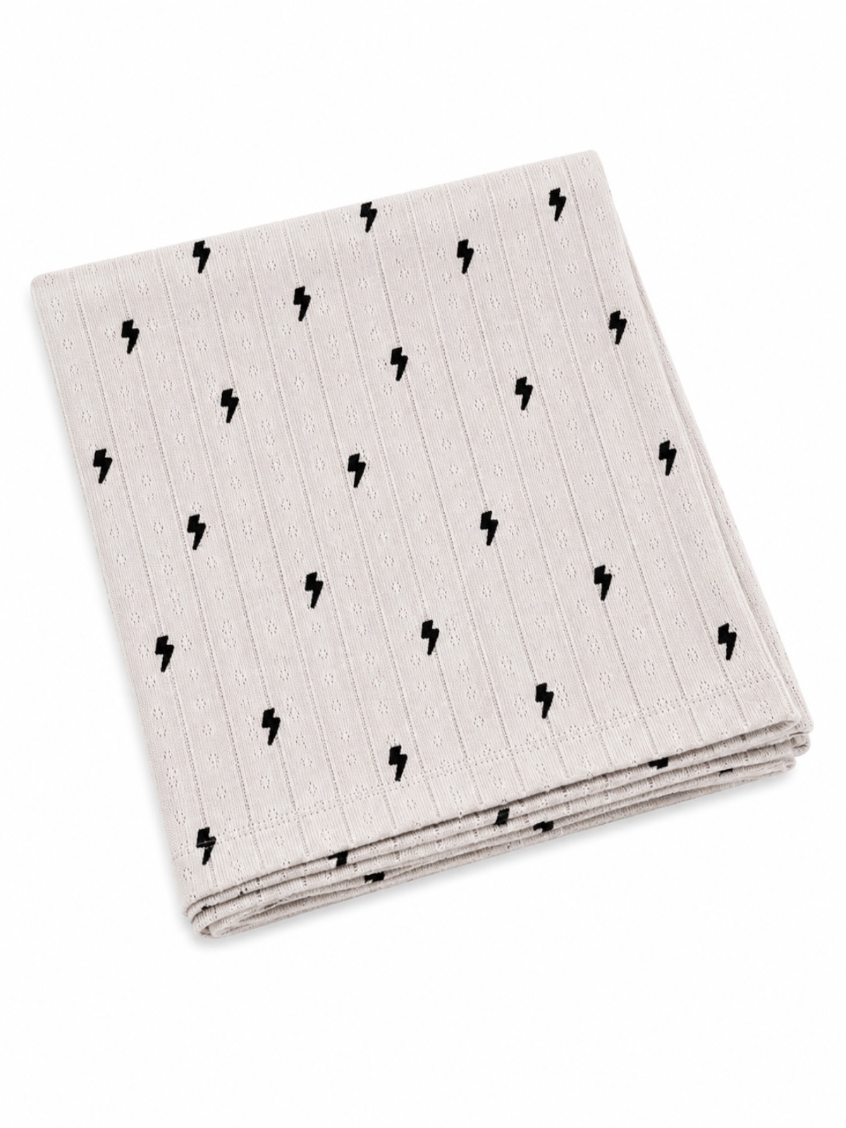 Light gray cloth napkin with black lightning bolt pattern, folded neatly on a white background.