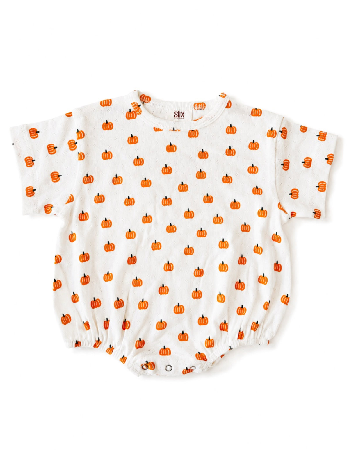 White baby onesie with a repeated orange pumpkin pattern throughout. Ideal for fall or Halloween themes.