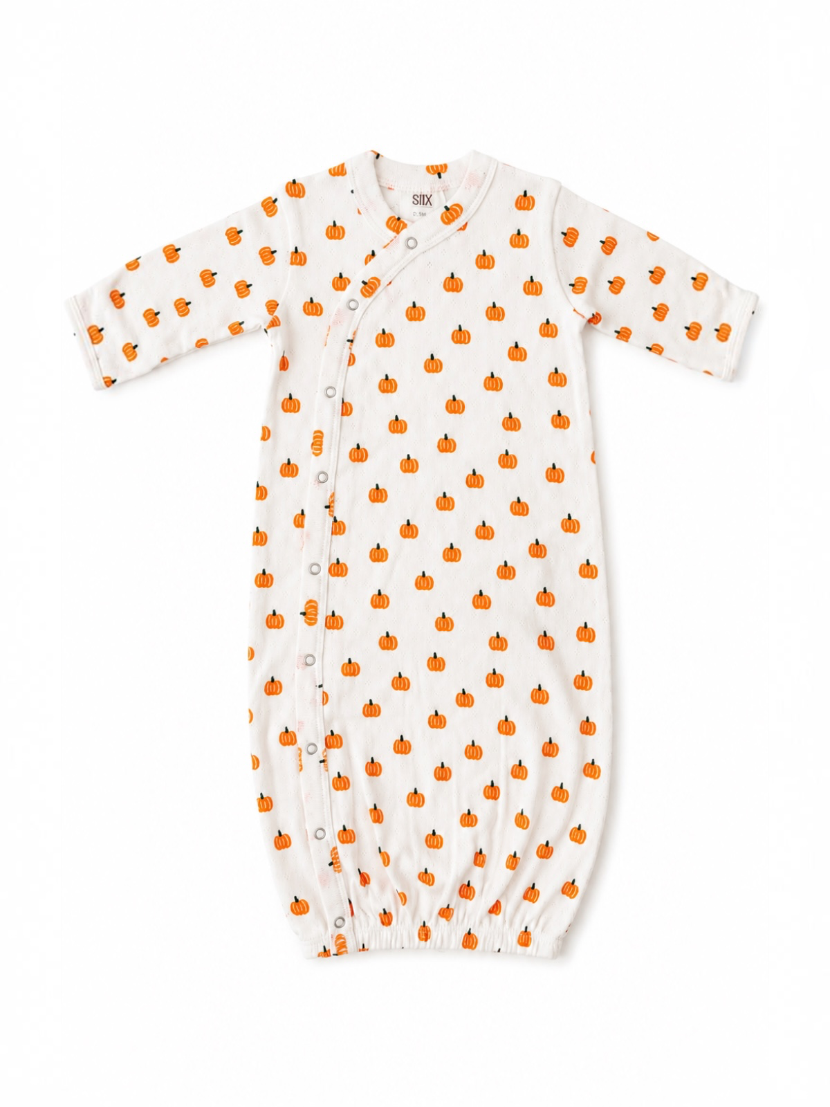 White baby gown with orange pumpkin pattern and snap buttons, perfect for fall festivities.