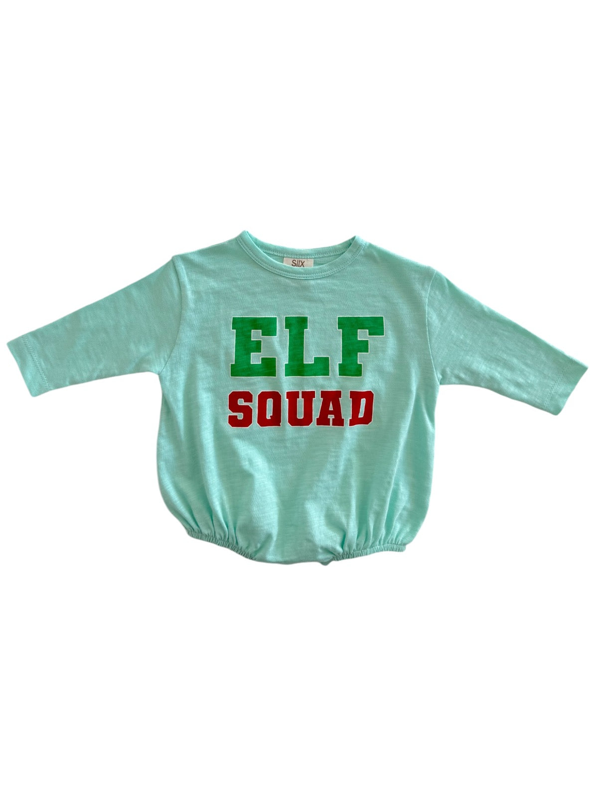 Light blue shirt with "ELF SQUAD" in green and red letters, featuring long sleeves and a gathered hem.