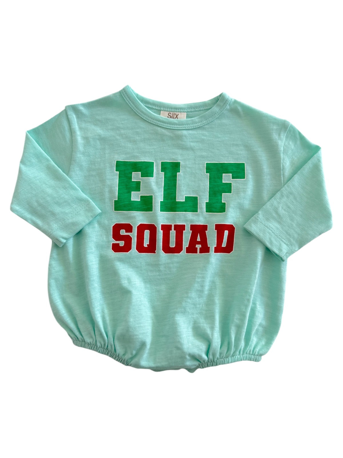Light blue shirt with "ELF SQUAD" printed in green and red letters. Suitable for festive occasions.