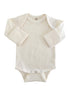 Cream-colored baby bodysuit with long sleeves and snap closures at the bottom. Soft ribbed texture.