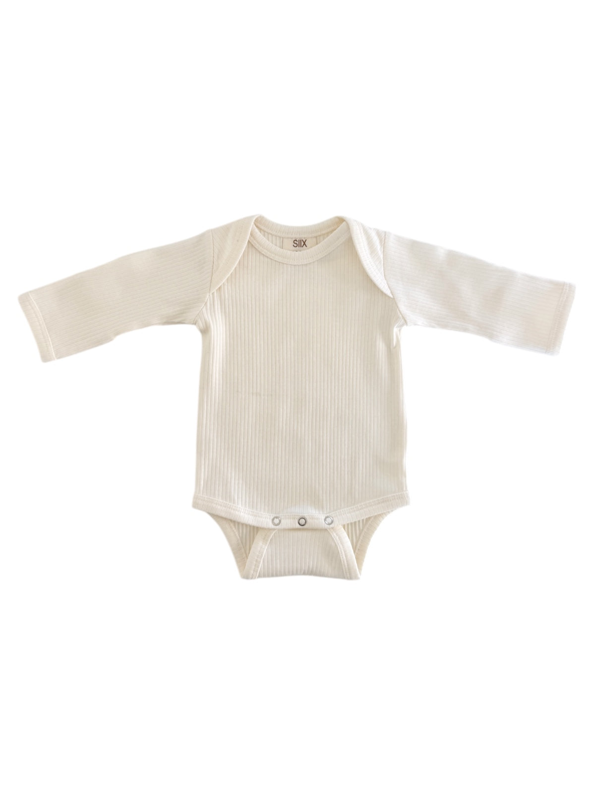Cream-colored, long-sleeve baby bodysuit with ribbed texture and snap closure at the bottom.