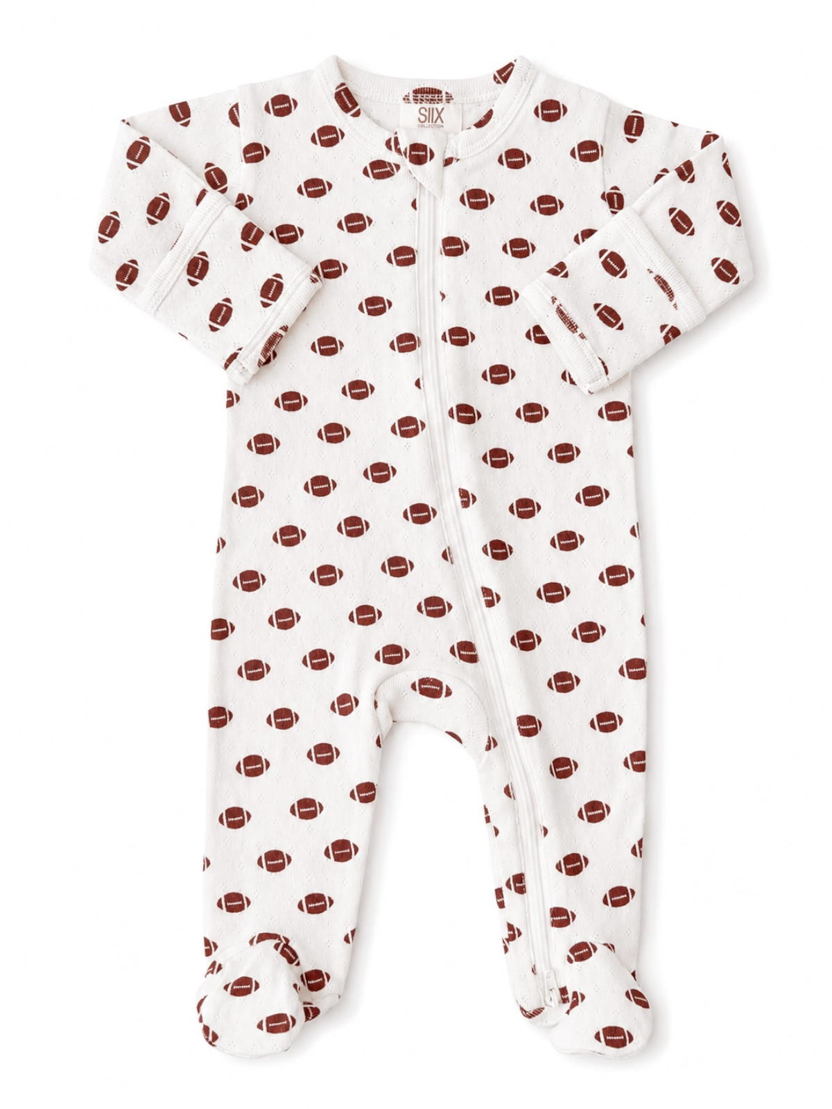 Baby onesie with a football pattern in red on a white background, featuring a zip closure and footed design.