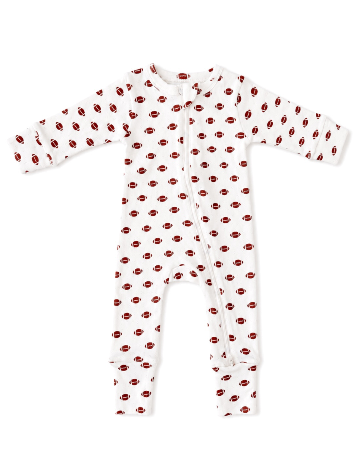 White baby onesie with red football patterns, featuring long sleeves and a front zipper closure.