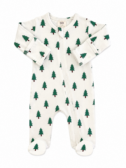 White baby onesie with green Christmas tree print and footed bottoms, featuring a front zipper closure.