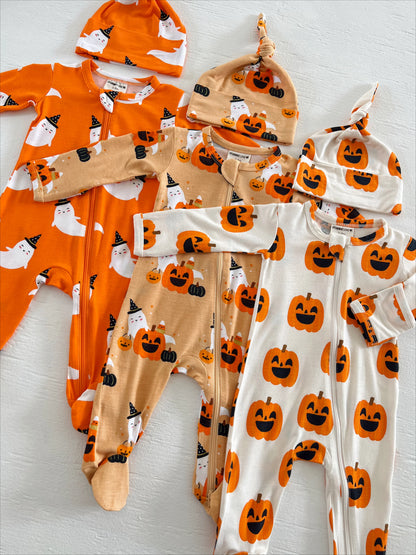 Colorful baby Halloween outfits featuring ghost and pumpkin patterns on onesies and hats.