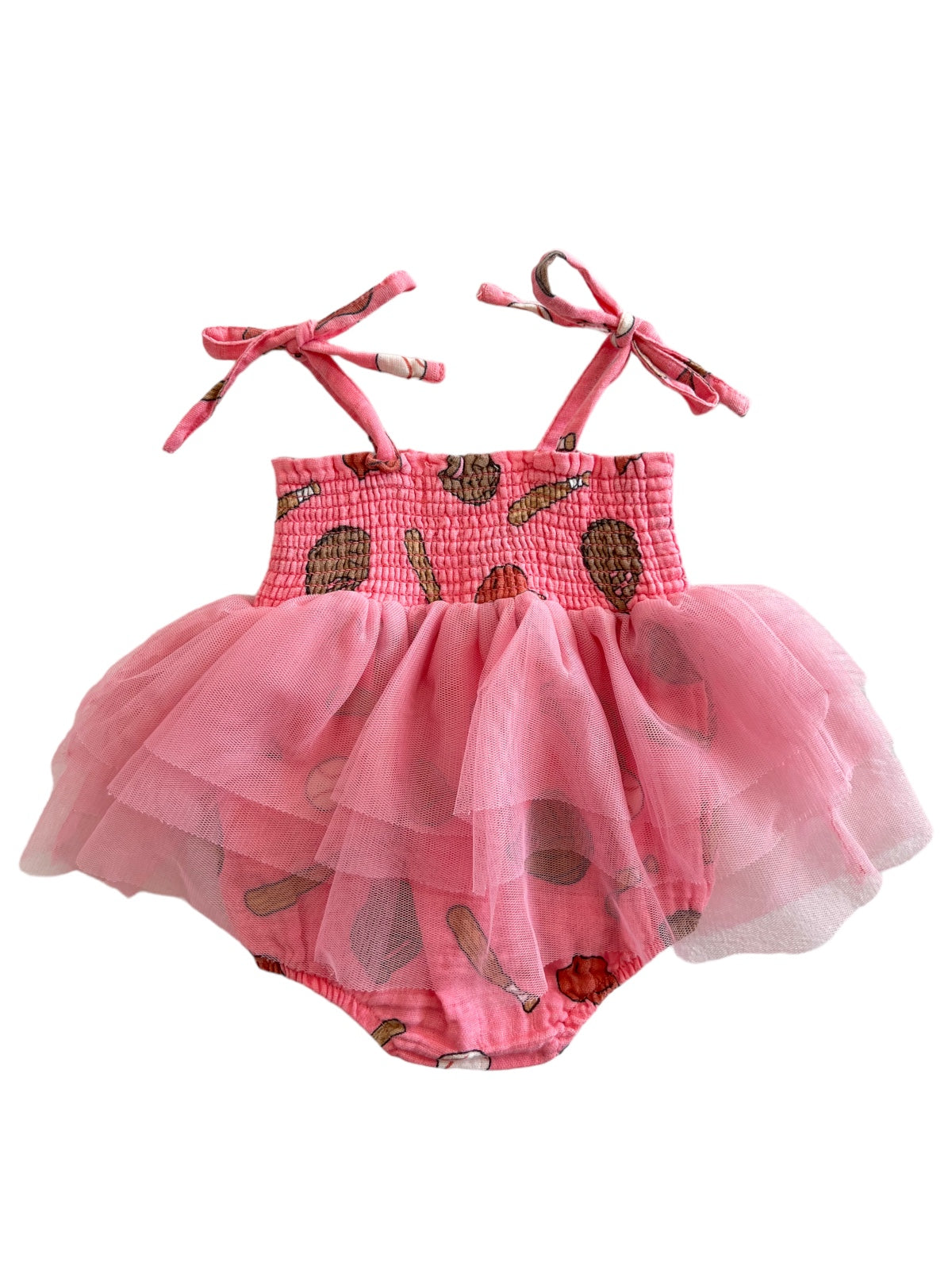 Pink baby dress with spaghetti straps and tulle skirt, featuring a playful food print. Perfect for summer wear.