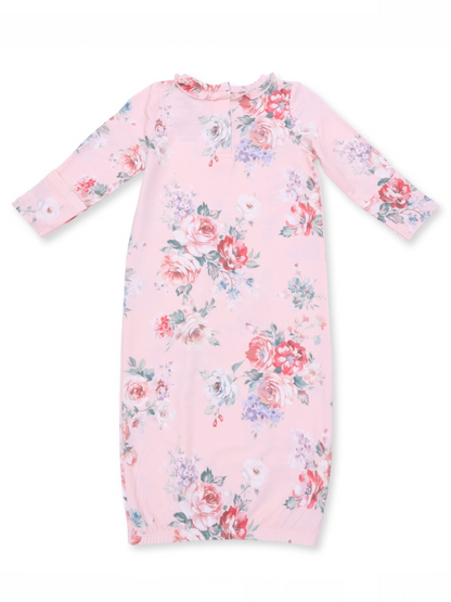Pink floral baby gown with long sleeves and a ruffled collar. Ideal for comfort and style.