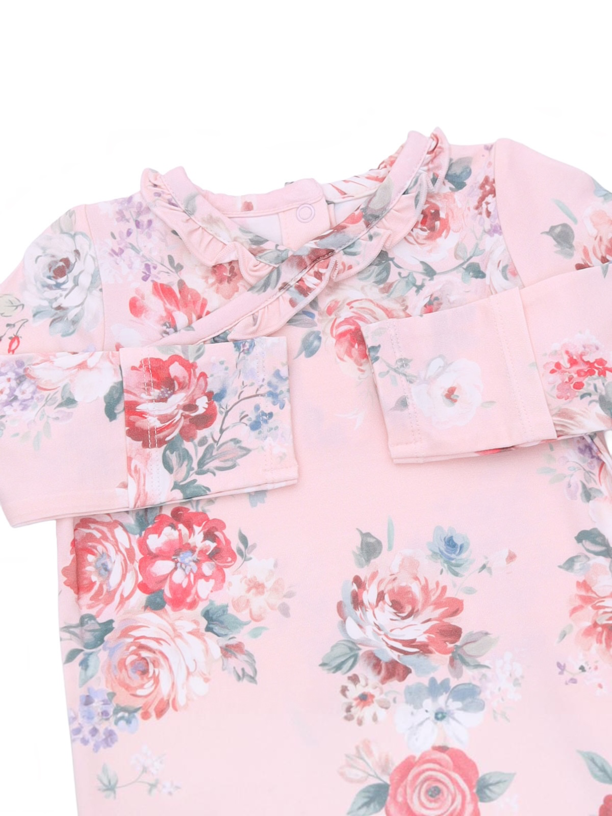 Floral-patterned pink dress with ruffles and button closure, ideal for children’s casual wear.