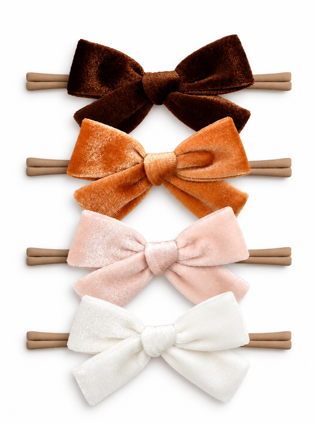 Four hair bows in brown, orange, pink, and white, displayed on brown hair ties.