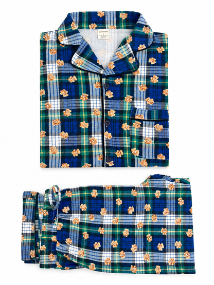 Blue and green checkered pajamas with teddy bear print, featuring a button-up top and matching pants.