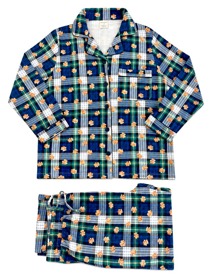 Blue and green plaid pajama set featuring a button-up shirt and matching pants with a playful teddy bear print.