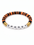 Black and orange striped bracelet with white beads spelling "SPOOKY" and gold accents. Perfect for Halloween.