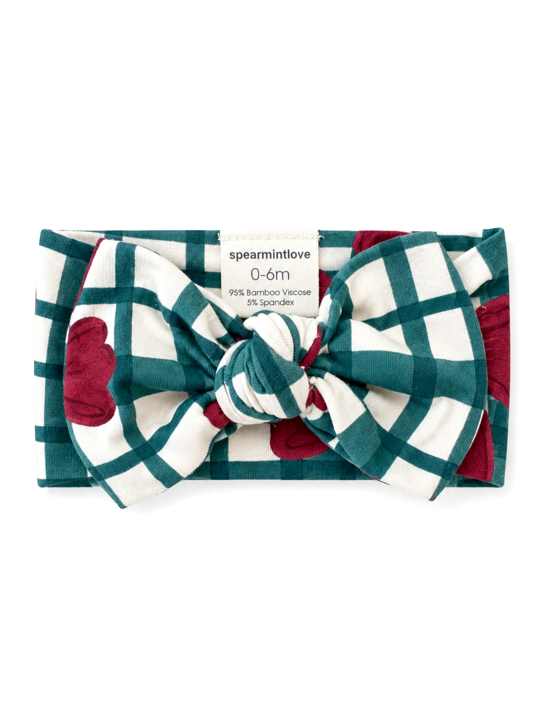 Bamboo viscose headband with a large bow, featuring a teal and white checkered pattern and floral design.