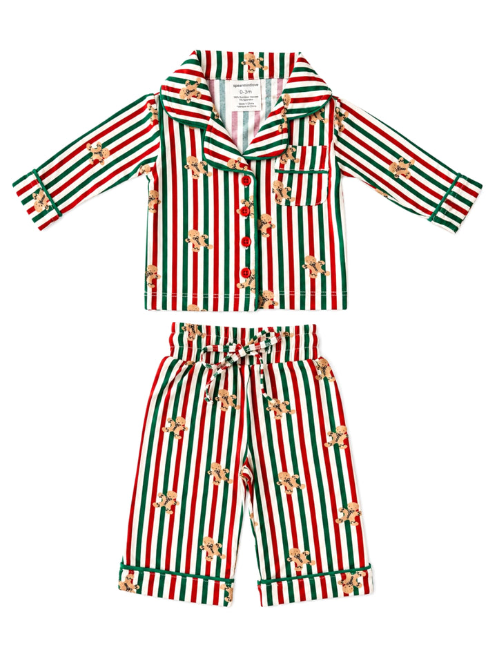 Red and green striped children's pajamas with gingerbread patterns. Includes a button-up top and matching pants.