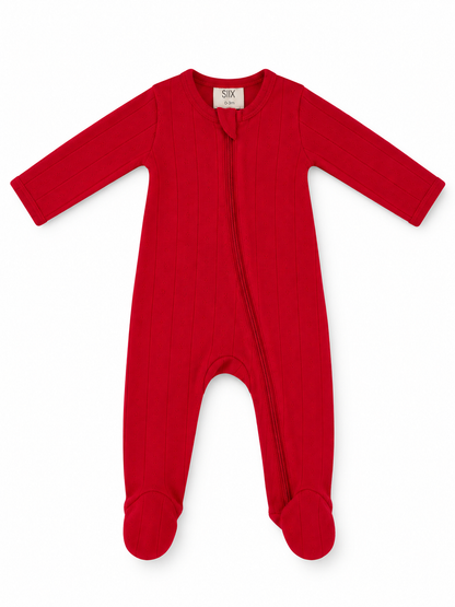 Red baby onesie with long sleeves and bottom footed design, featuring a front zipper for easy dressing. Size 0-3 months.