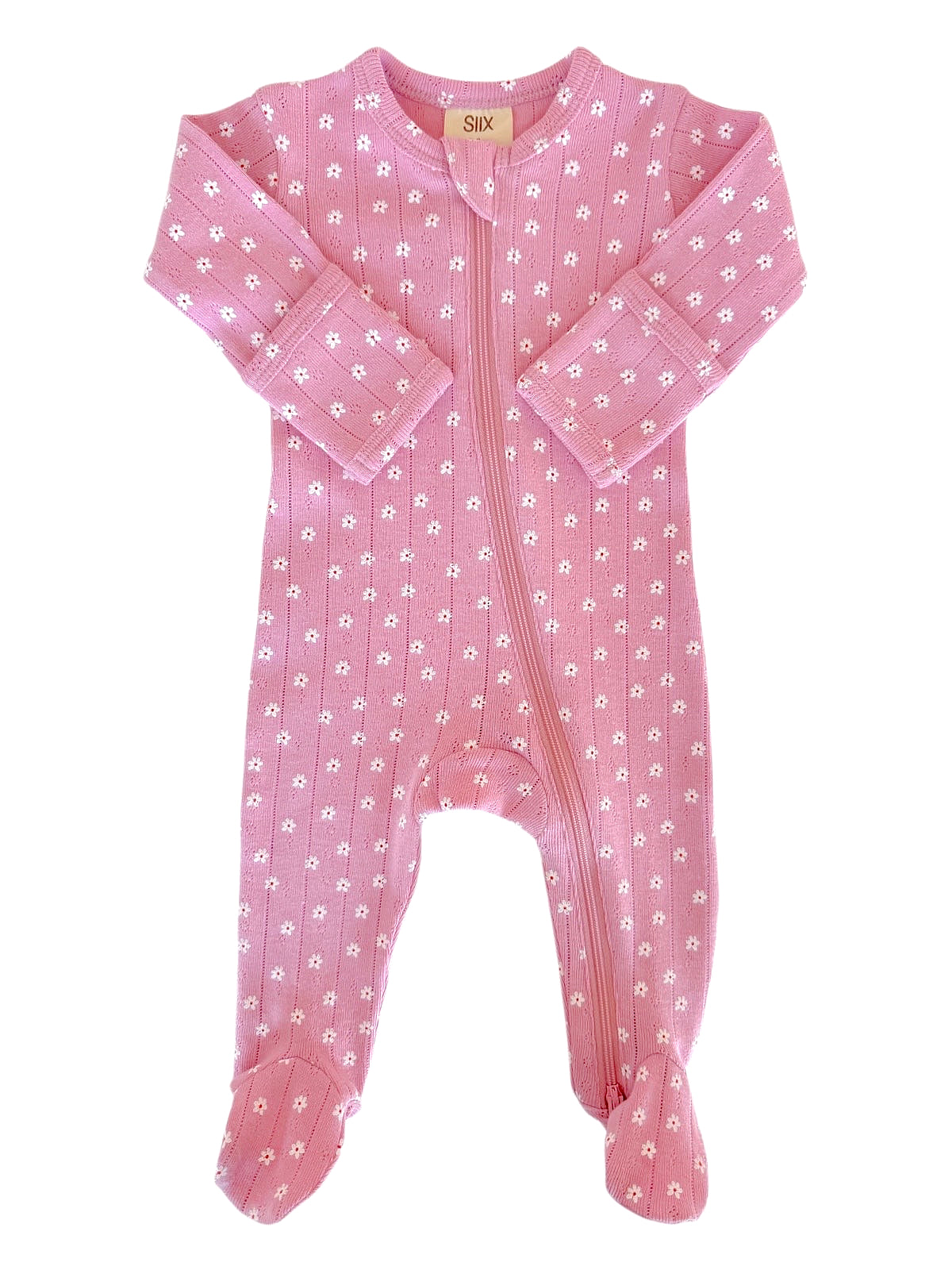 Pink infant onesie with white floral patterns and a front zipper, featuring long sleeves and footed design.