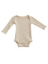 Light beige long-sleeve baby bodysuit displayed flat. Soft, ribbed texture, suitable for infants.