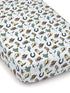 Light blue crib sheet featuring a western pattern of boots, hats, cacti, horseshoes, and cow skulls.
