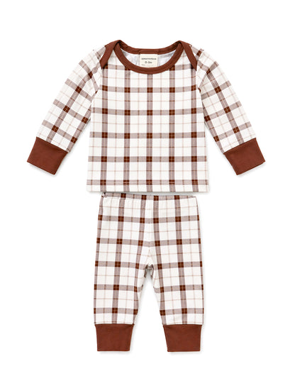 Brown and white plaid baby pajama set with long sleeves and pants. Soft fabric and comfortable design for infants.
