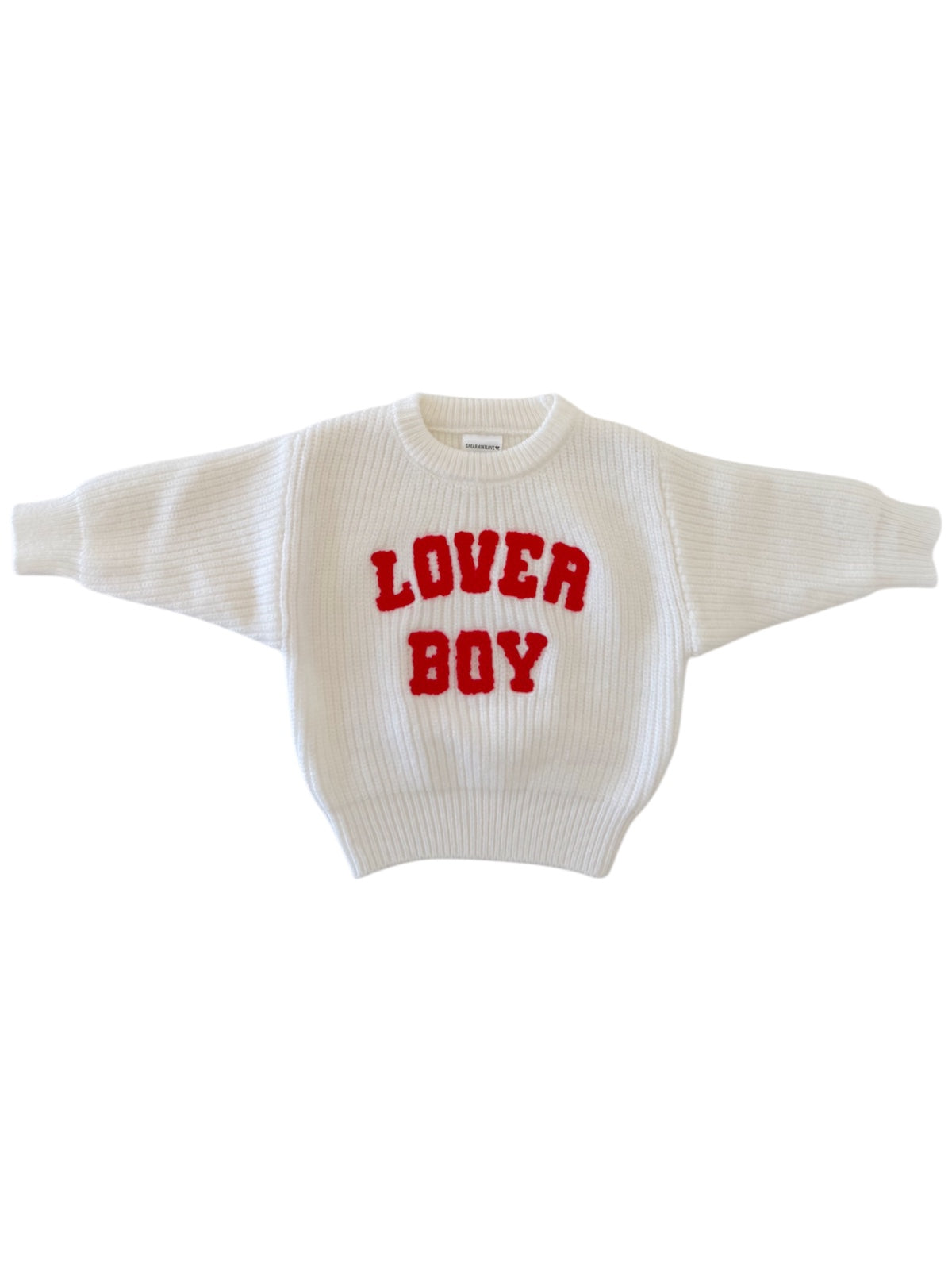 White sweater with red text that reads "LOVER BOY" on the front, featuring a ribbed design and wide sleeves.